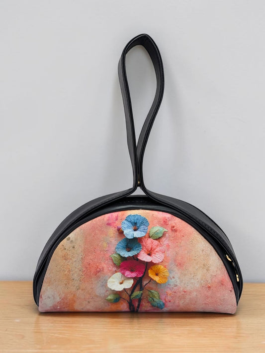 The Chandrika Loop Clutch