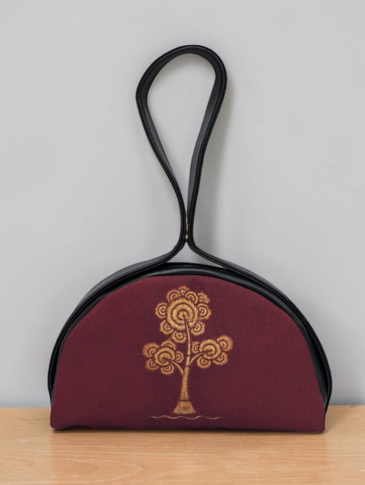 The Chandrika Loop Clutch