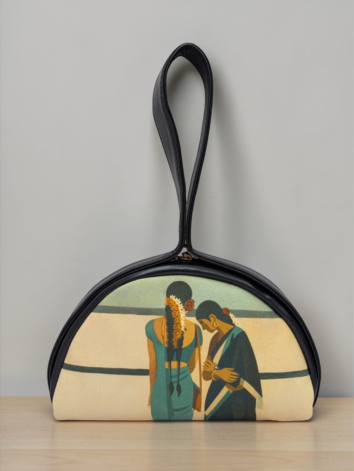 The Chandrika Loop Clutch