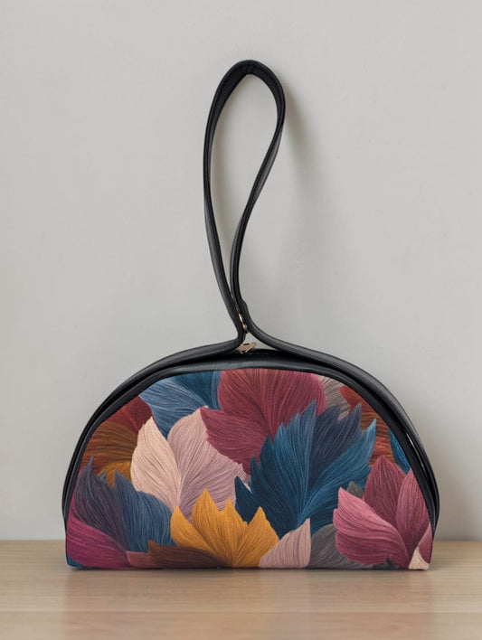 The Chandrika Loop Clutch