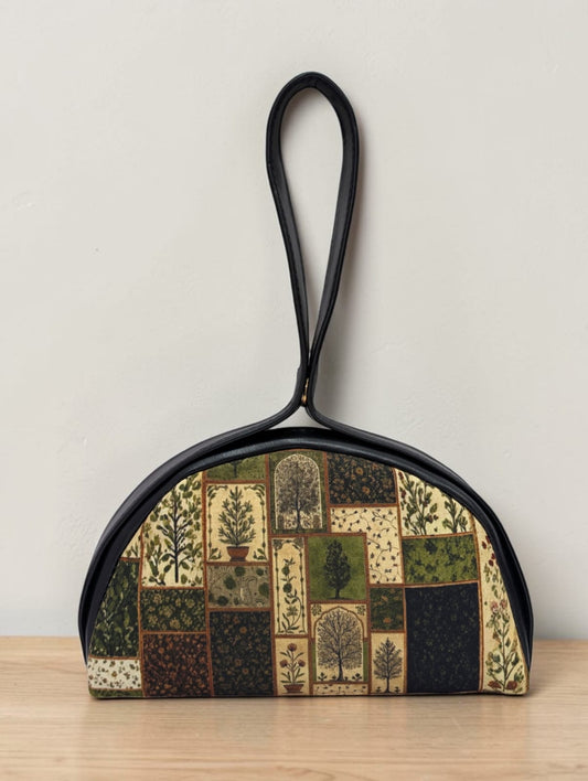 The Chandrika Loop Clutch