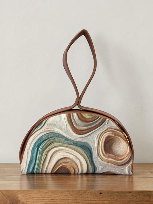 The Chandrika Loop Clutch