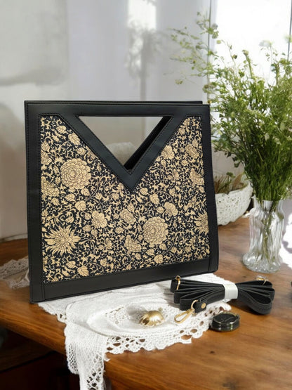 The V-Cut Satchel